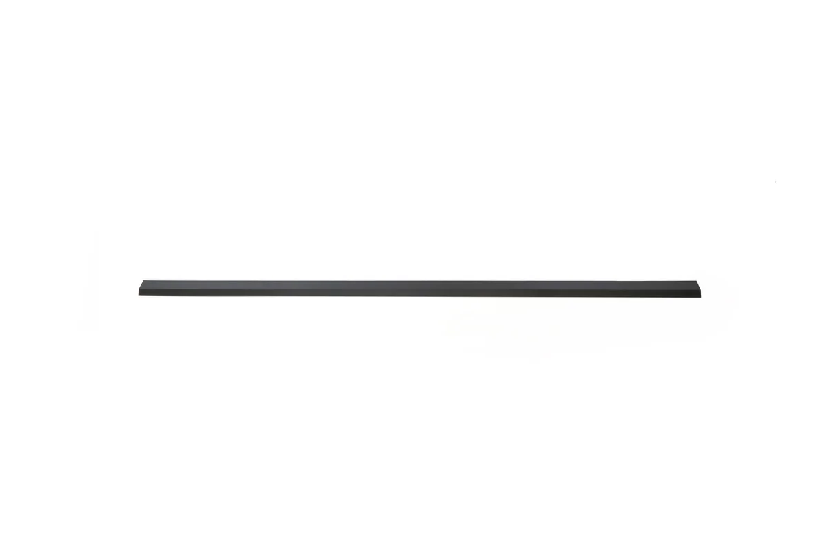 Narrow black vertical flashing strip for sealing a Lumina Slate solar roof transition.