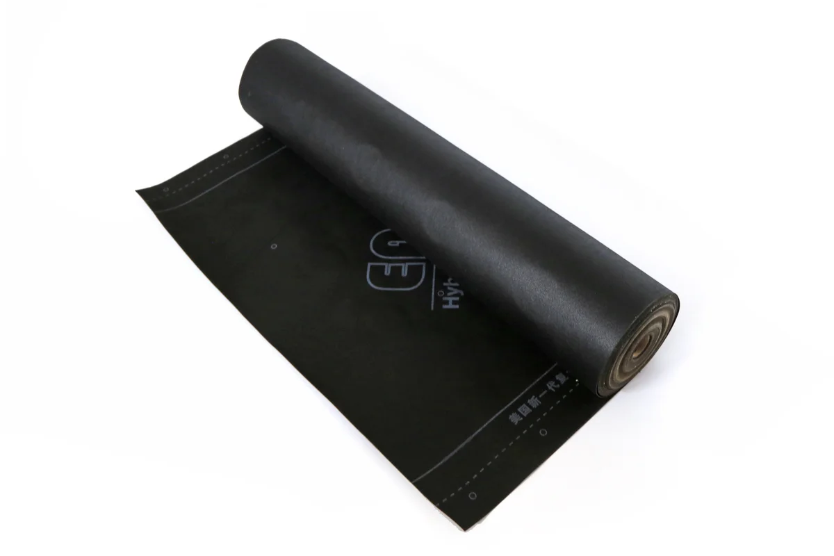 Black waterproof roofing membrane roll for use beneath solar roof components.