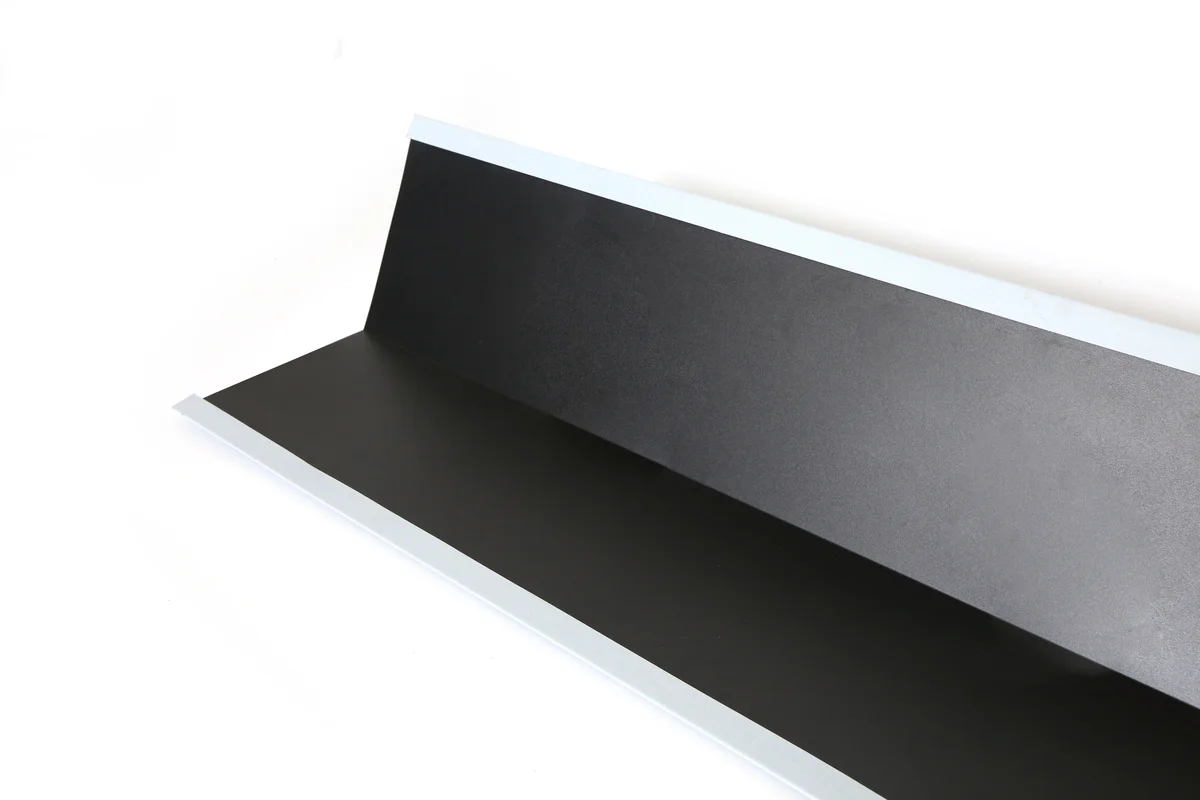 Black metal gutter board with mounting flange for a Storm Guard solar roof.