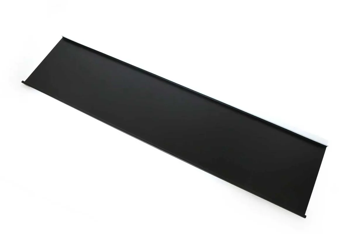Black non-active metal sheet matching the finish of a Storm Guard solar roof.