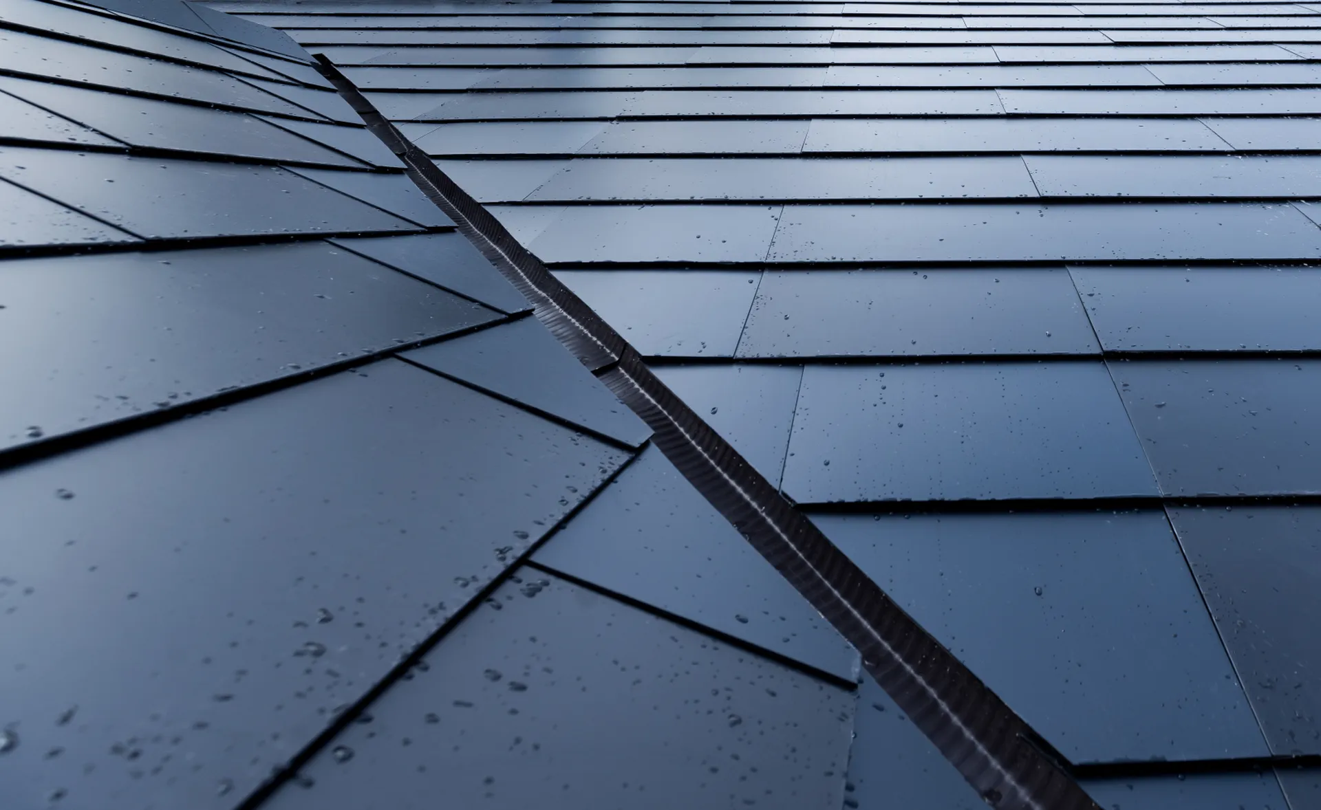 Detailed view of the precision valley flashing on the solar roof, ensuring perfect waterproofing for intersecting slopes.