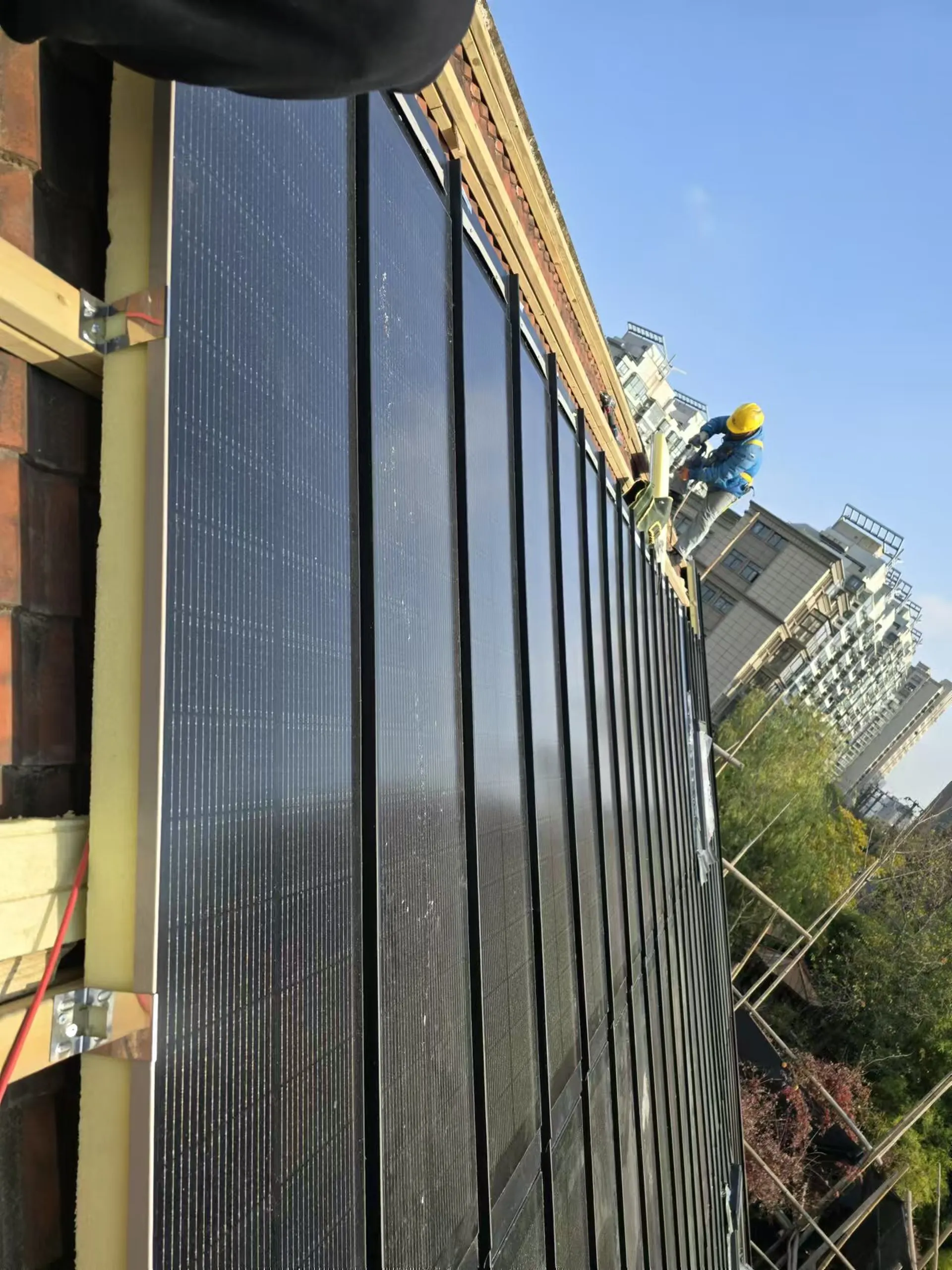 Side profile close-up showing the robust interlocking design and underlying insulation of the Storm Guard system.